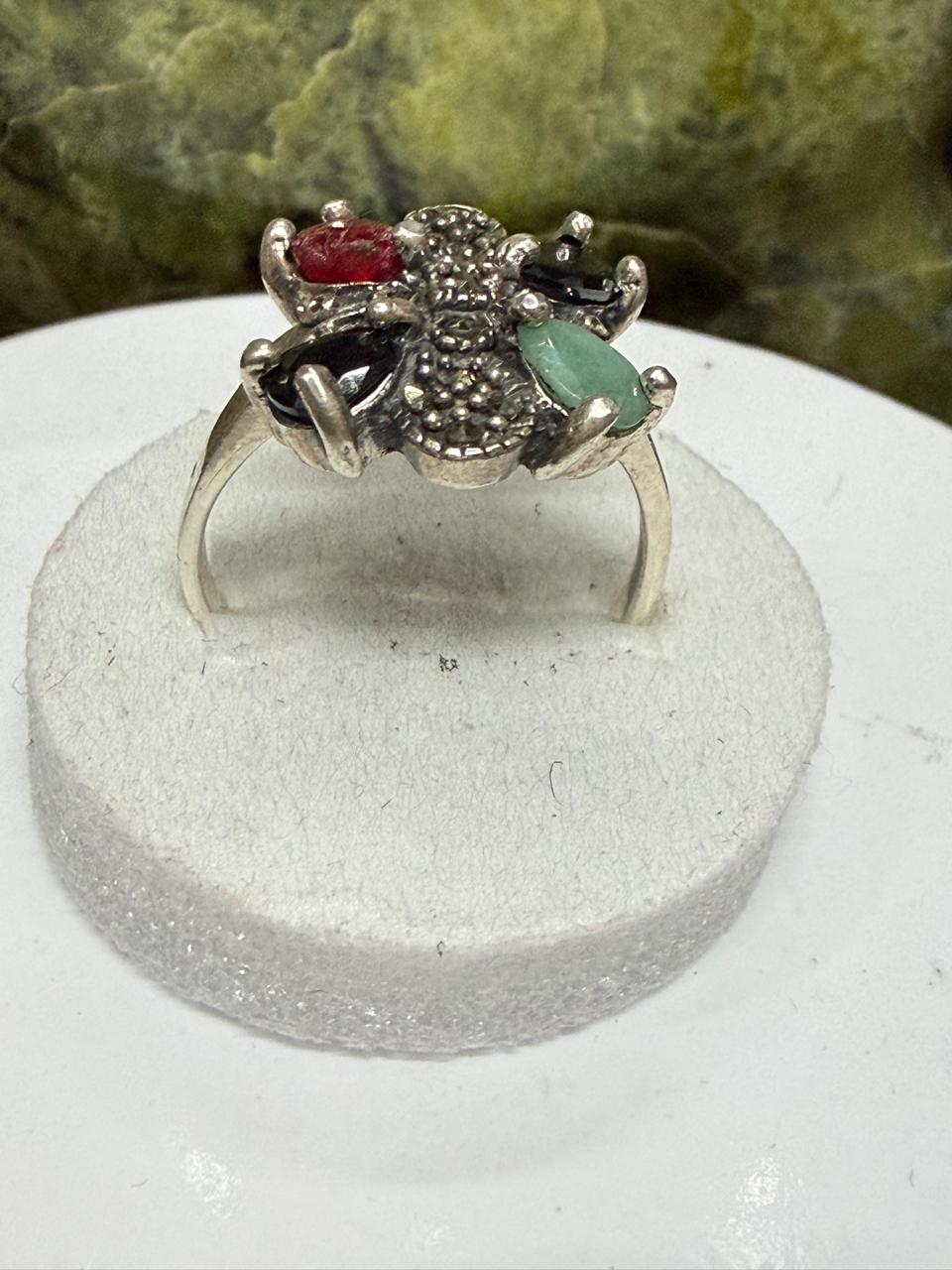 Luxury Multi-Stone Ruby, Emerald & Sapphire Ring – 925 Sterling Silver with Rhodium Polish**
Celebrate elegance and vibrant beauty with this exquisite Multi-Stone Ruby, Emerald & Sapphire Ring, meticulously crafted in genuine 925 Sterling Silver