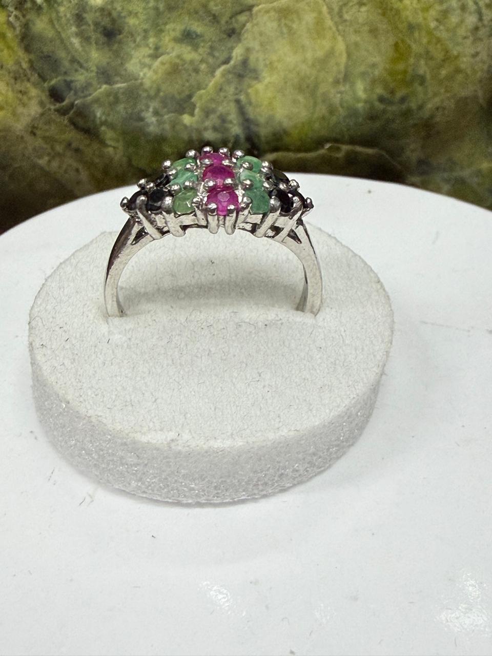 Luxury Multi-Stone Ruby, Emerald & Sapphire Ring – 925 Sterling Silver with Rhodium Polish**
Celebrate elegance and vibrant beauty with this exquisite Multi-Stone Ruby, Emerald & Sapphire Ring, meticulously crafted in genuine 925 Sterling Silver and en