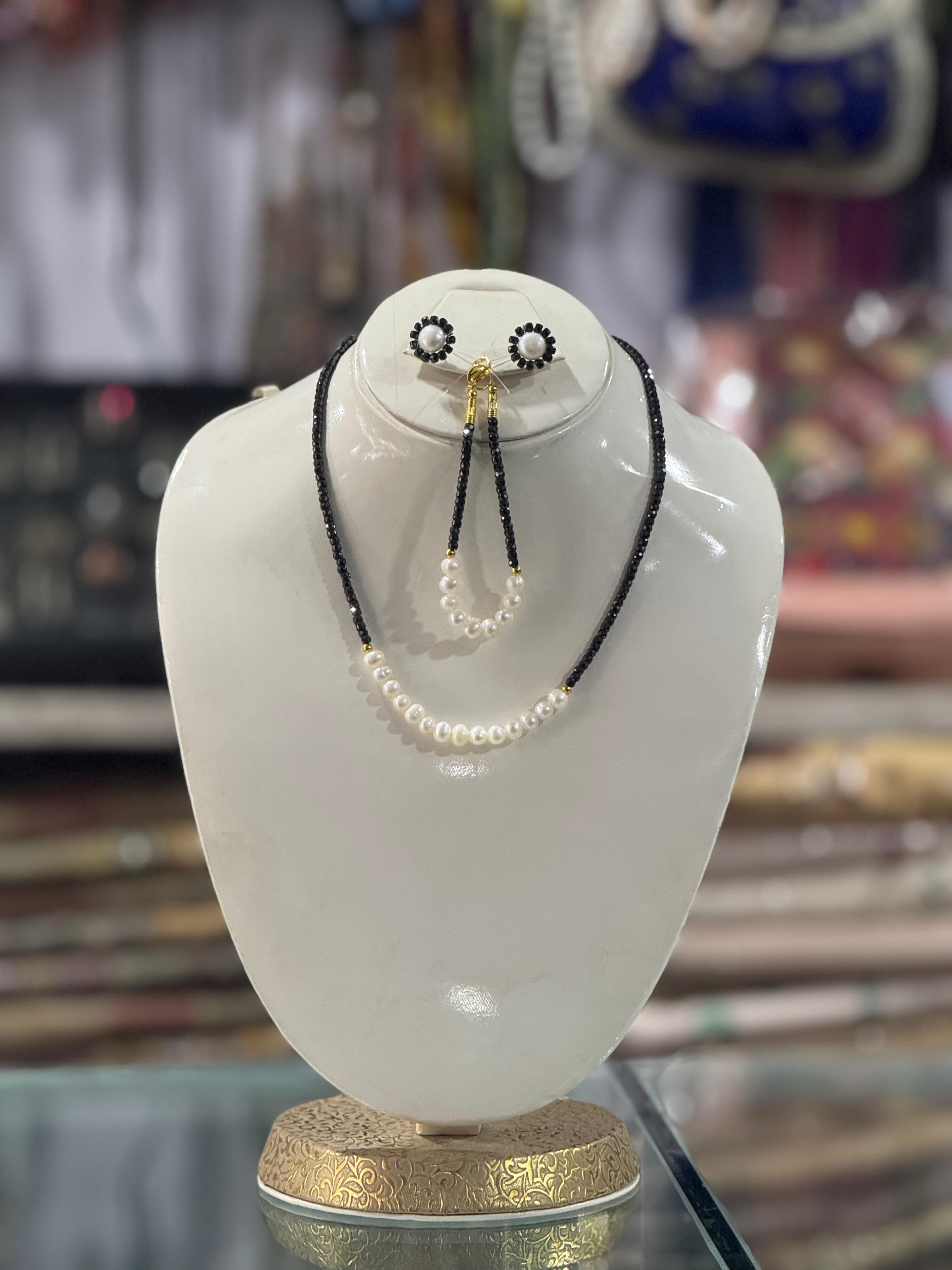 Fresh Water Pearls and Black Zircon Stone Set