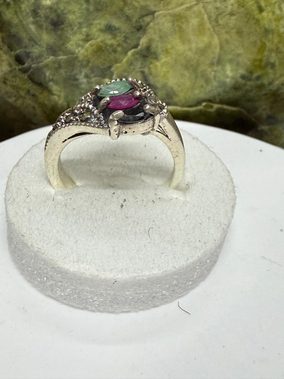 Luxury Multi-Stone Ruby, Emerald & Sapphire Ring – 925 Sterling Silver with Rhodium Polish**
Celebrate elegance and vibrant beauty with this exquisite Multi-Stone Ruby, Emerald & Sapphire Ring, meticulously crafted in genuine 925 Sterling Silver