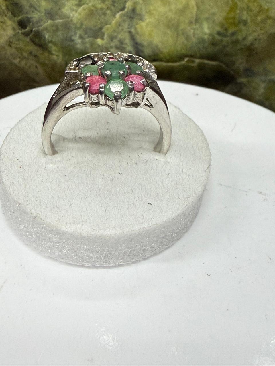 Luxury Multi-Stone Ruby, Emerald & Sapphire Ring – 925 Sterling Silver with Rhodium Polish**



Celebrate elegance and vibrant beauty with this exquisite Multi-Stone Ruby, Emerald & Sapphire Ring, meticulously crafted in genuine 925 Sterling Silver